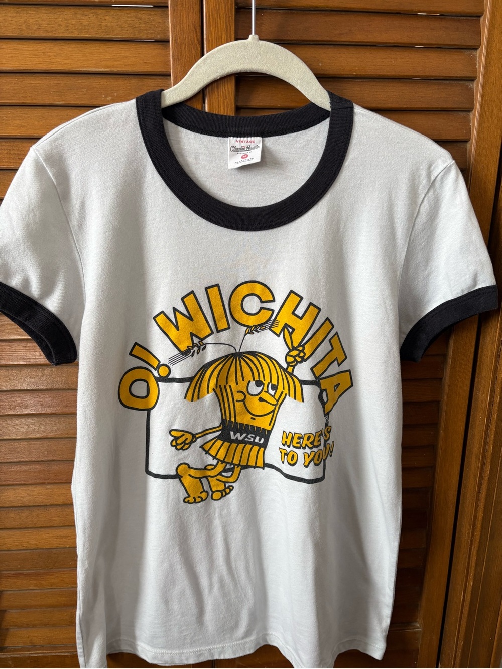 Charlie Hustle Vintage White Ringer Tee with Black Trim, Yellow Wichita Graphic